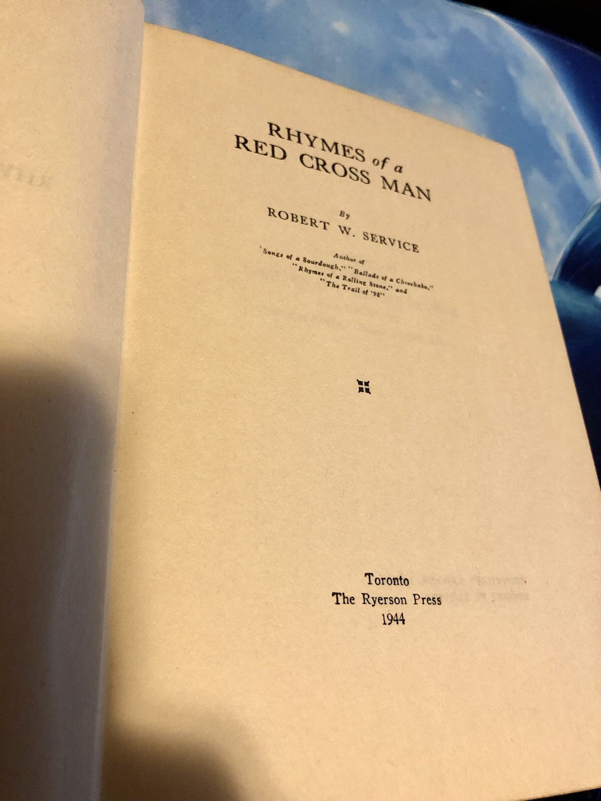 RHYMES OF A RED CROSS MAN---ROBERT W. SERVICE---HC---1944---THE RYERSON PRESS